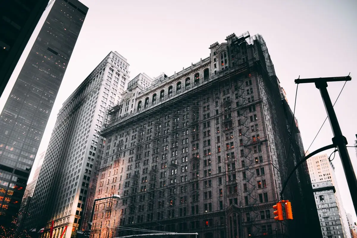 Historic New York building with sidewalk scaffolding
